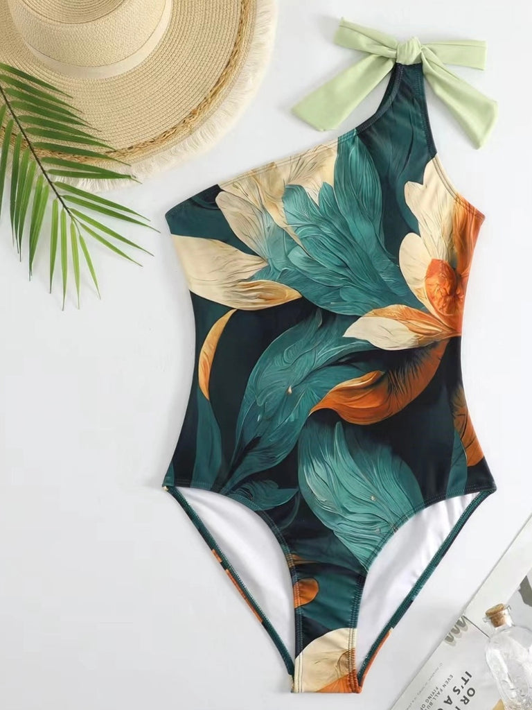 Swim Set , featuring a unique bowtie shoulder, classic shape, and stunning floral print, this one piece swimwear is made with 80% Polyester and 20% Spandex .