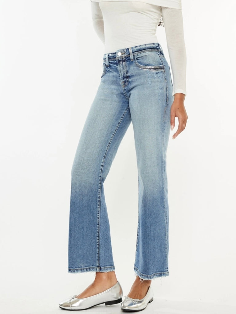 Wide Leg Kancan Jeans features whiskering, minimal distress, 5-pocket style, one button closure, and zip fly