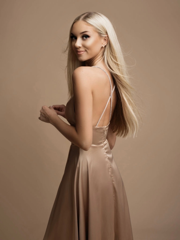 Long Beige  Satin Maxi -Dress features a wide waist and criss-cross strap back and plunging front v with a side slit in the skirt.