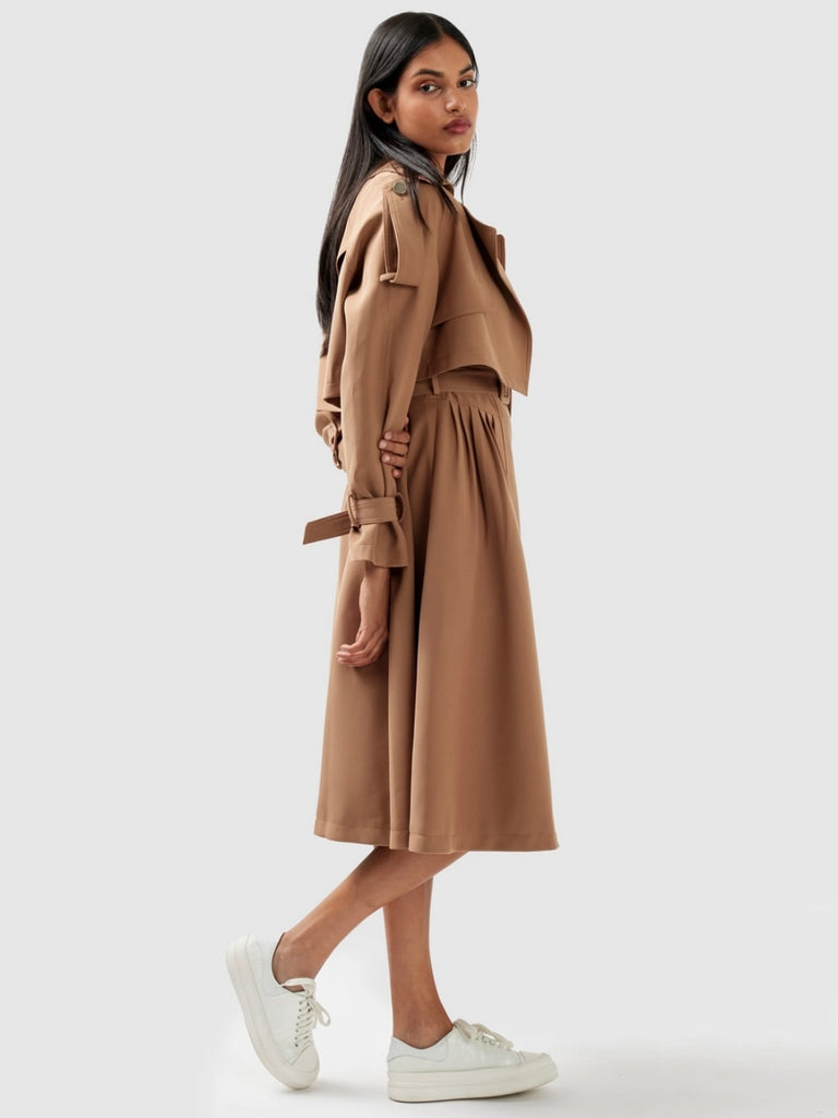 Relaxed Fit , Belted Cropped Trench ,with classic storm flap detailing and finished off with gold tone hardware.