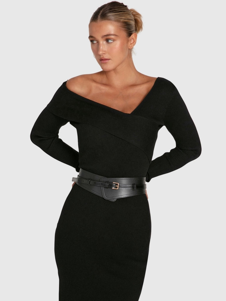 Solid Black Knit  Dress , made from a warm and soft ribbed knit material, this dress features an asymmetrical off-shoulder folded neckline ,and a figure-hugging silhouette in a classic knee length .