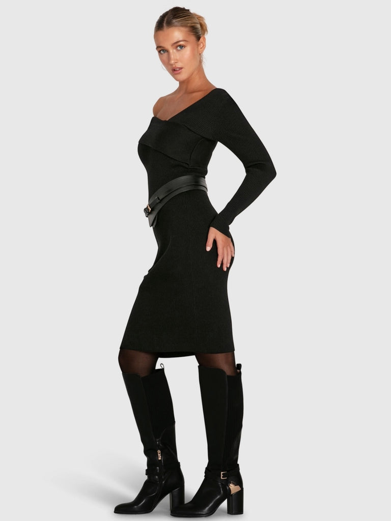 Solid Black Knit  Dress , made from a warm and soft ribbed knit material, this dress features an asymmetrical off-shoulder folded neckline ,and a figure-hugging silhouette in a classic knee length .