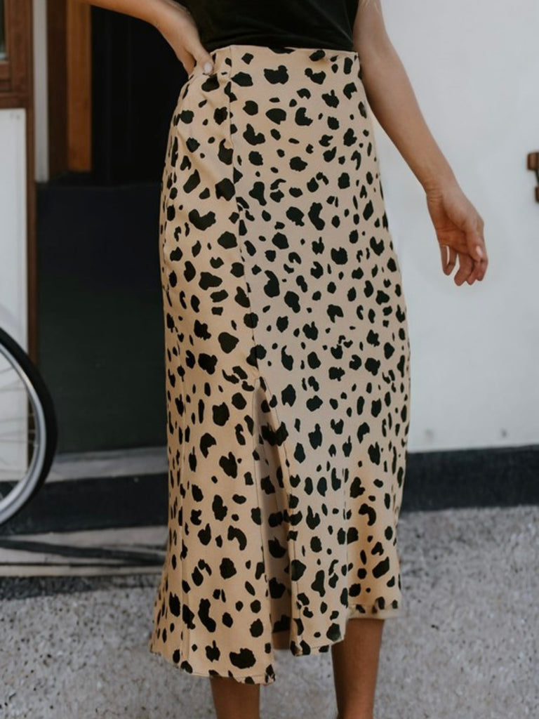 Spotted Animal Print Midi Skirt with a high waist and fit flare silhouette.