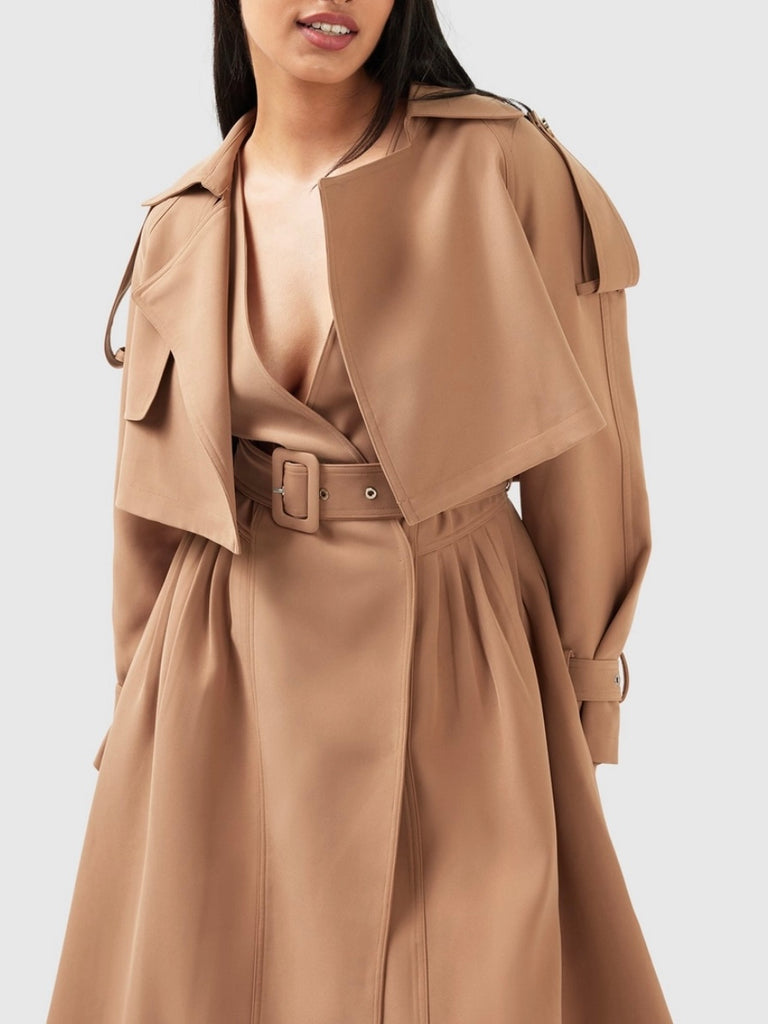 Relaxed Fit , Belted Cropped Trench ,with classic storm flap detailing and finished off with gold tone hardware.