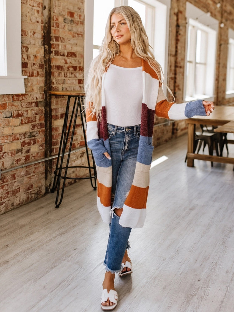  Ralley Long Cardigan! Made from soft and warm knitted fabric, this cardigan features a playful color block design. The open front makes it versatile and perfect for layering. 