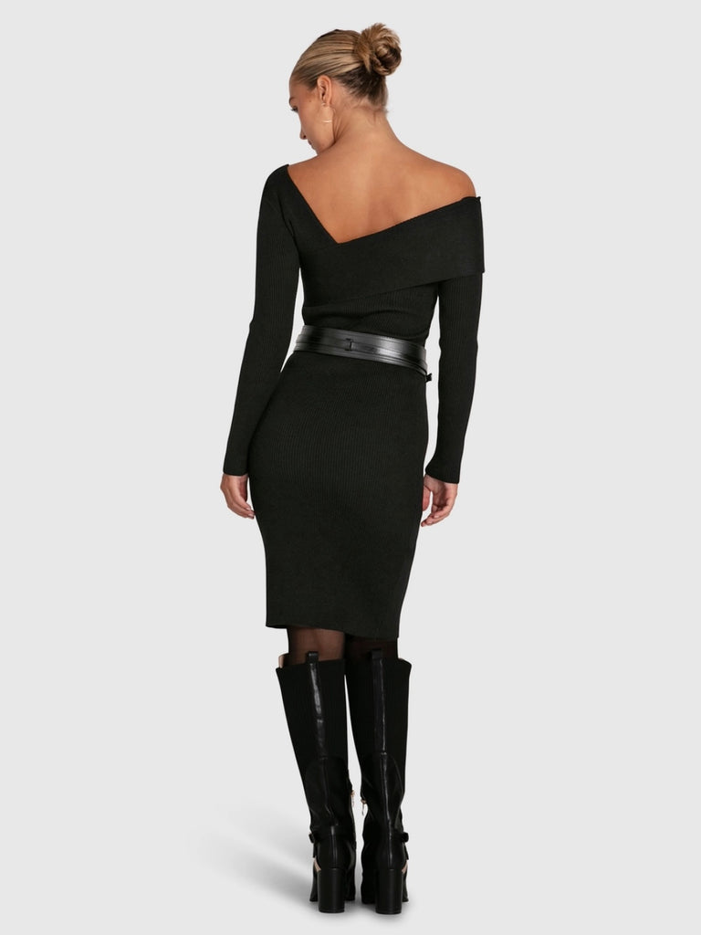 Solid Black Knit  Dress , made from a warm and soft ribbed knit material, this dress features an asymmetrical off-shoulder folded neckline ,and a figure-hugging silhouette in a classic knee length .