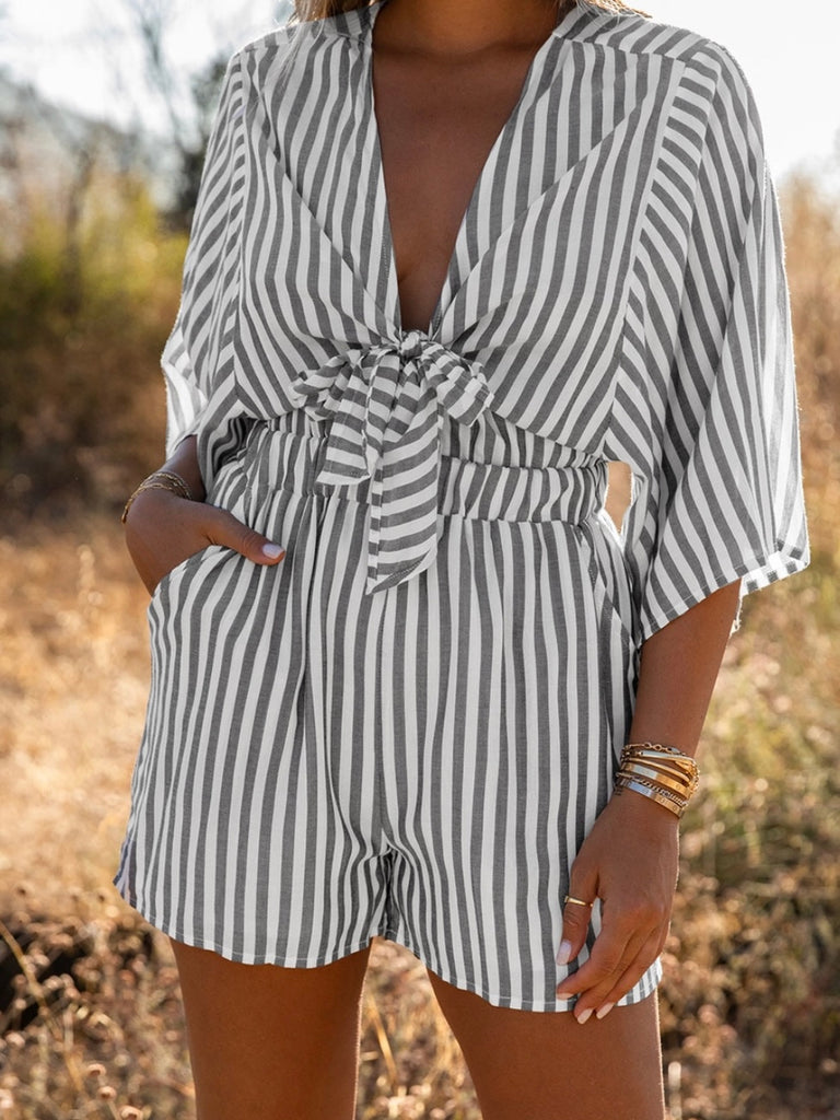 Stripe Romper boasts 3/4 kimono sleeves and a trendy striped with a tie front .