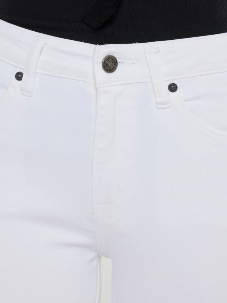 White Kancan Raw Hem ankle-length Skinny Jeans , featuring an asymmetrical raw cut hem and Single button front closure, Zip fly.