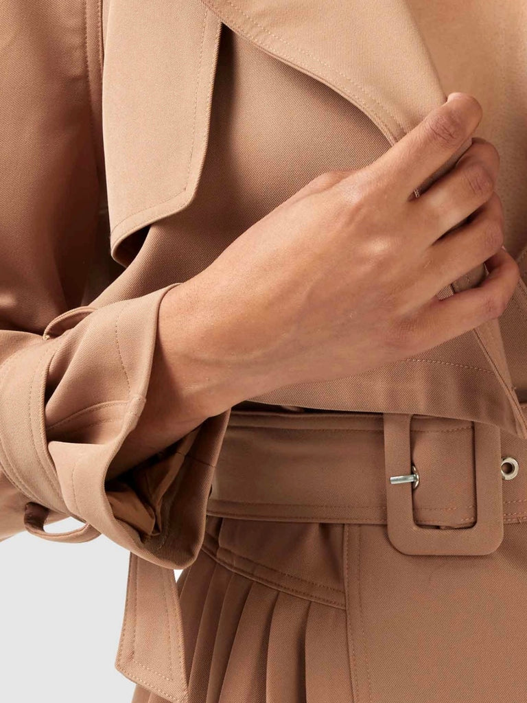 Relaxed Fit , Belted Cropped Trench ,with classic storm flap detailing and finished off with gold tone hardware