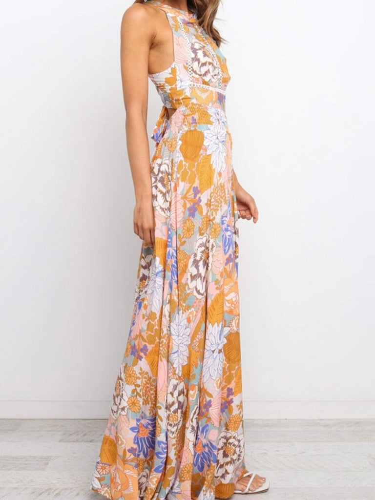 Floral print and sleeveless halter style tie, open back, maxi dress.