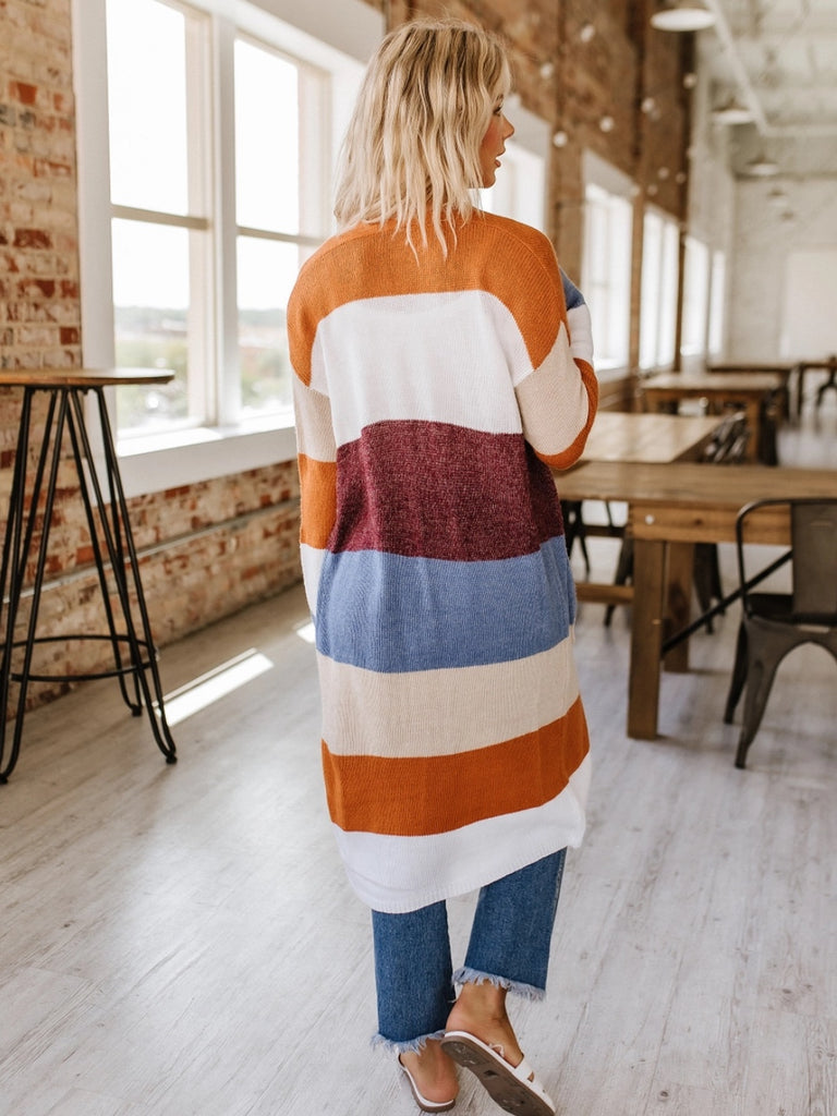  Ralley Long Cardigan! This cardigan features a playful color block design. The open front makes it versatile and perfect for layering. 