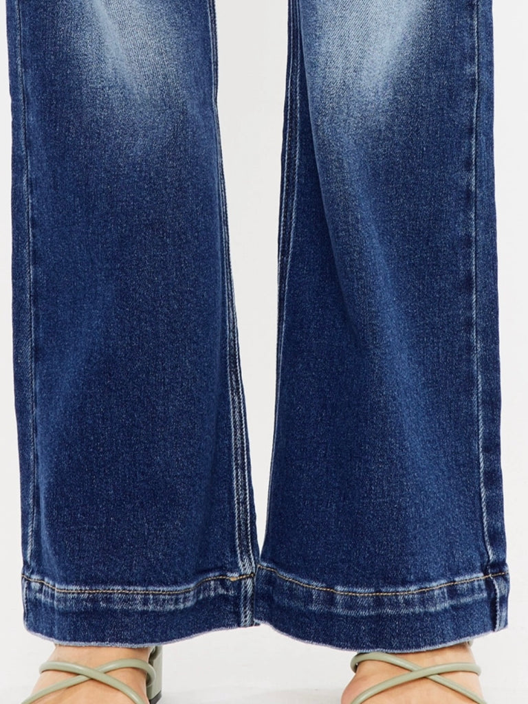 High Rise Faded Flare Jeans, Features a classic five-pocket design, single-button front, and zip-fly closure.