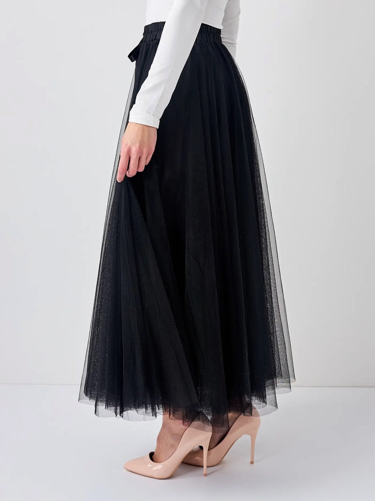 Maxi-length ,Black Tutu Skirt featuring a thin elastic waistband and flared cut with ruffle-effect details.