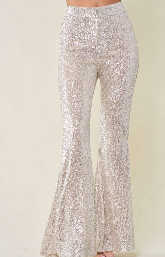 Elevate your wardrobe and express your individuality in these fully -lined Champagne Coloured Sequin Flare Pants.