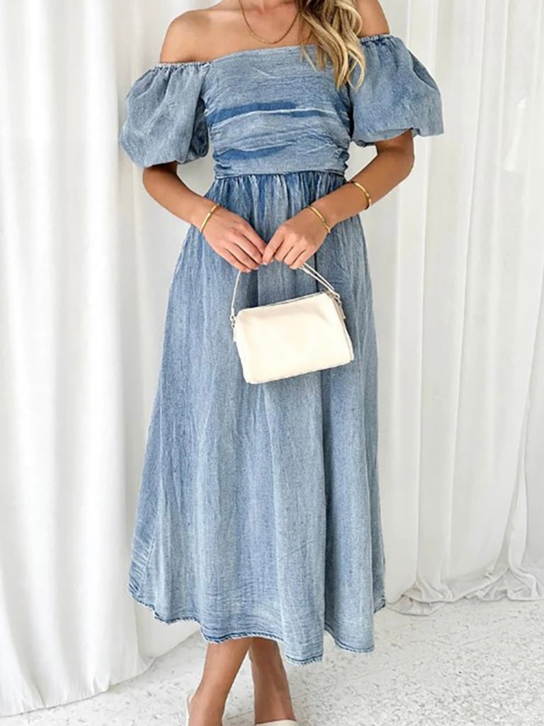 Deirdre Denim Dress with Long hemlines and romantic off the shoulders silhouette and puffy sleeves.