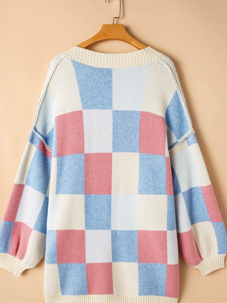 Pastel Pink, Blue, White, and Creamy Yellow Checkered Pattern Cardigan with a Relaxed Silhouette and drop shoulder  with exposed seams.