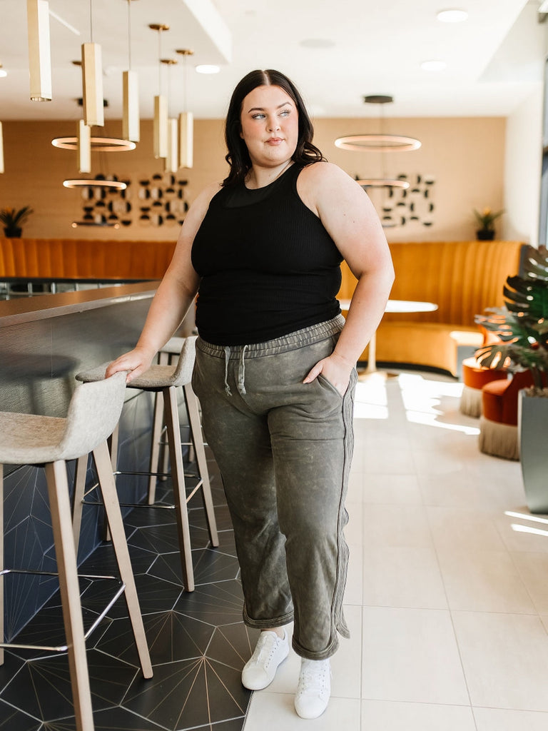 Medium Stretch Olive -Green elastic-waisted, straight-legged pant with two side pocket and hem slits, and tie waist.