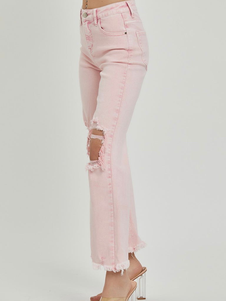 Acid Pink Jeans. Cropped length, distressed knees and frayed hemline.