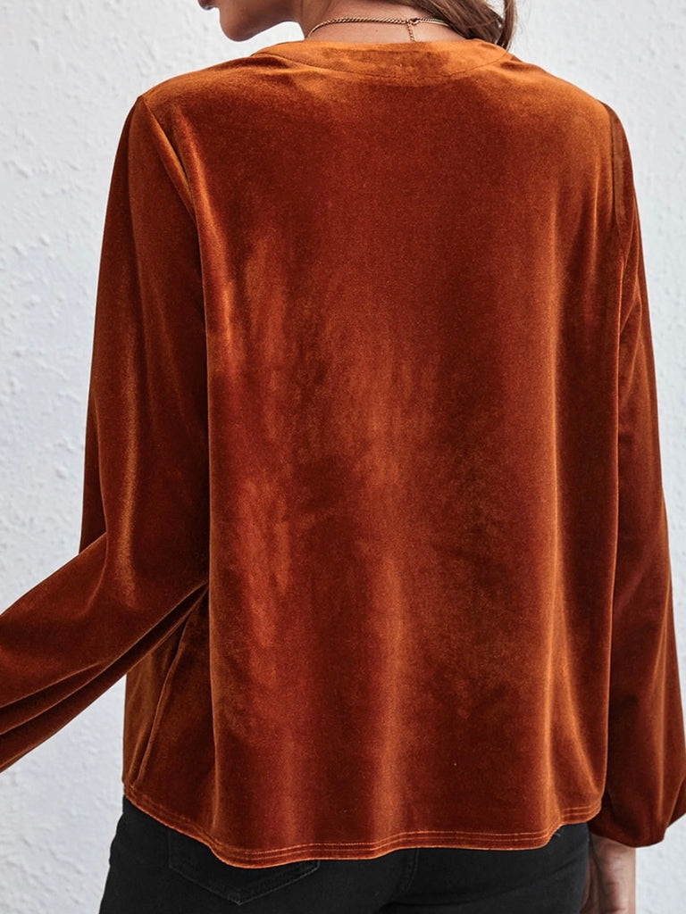 Copper ,Split v-neck Velvet Top with a Relaxed fit, and Lantern sleeves with elegant beaded details.