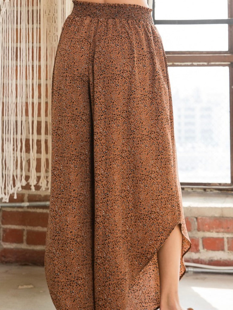 Brown Animal Print Smocked Pants elastic smocking diagonal cut sides that adds a unique detail.