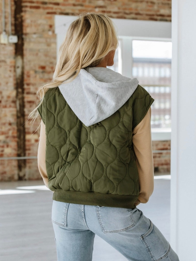 Olive Green ,Quilted Hooded Vest with attached grey hood for added warmth and zip style front closure.