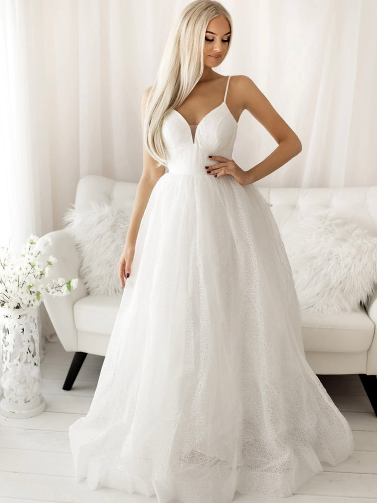  Champagne Dress in perfect angelic white, turn heads in this princess style gown with a wide waistband that cinches in at  the waist for a stunning silhouette .