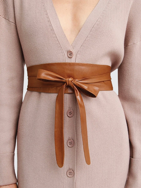 Soft Wrap Genuine Leather Belt lets you cinch your waist in a variety of ways. This soft, flexible, leather allows you to finish your look with a knot, a bow, or a fancy twist. Choose from brown or black!