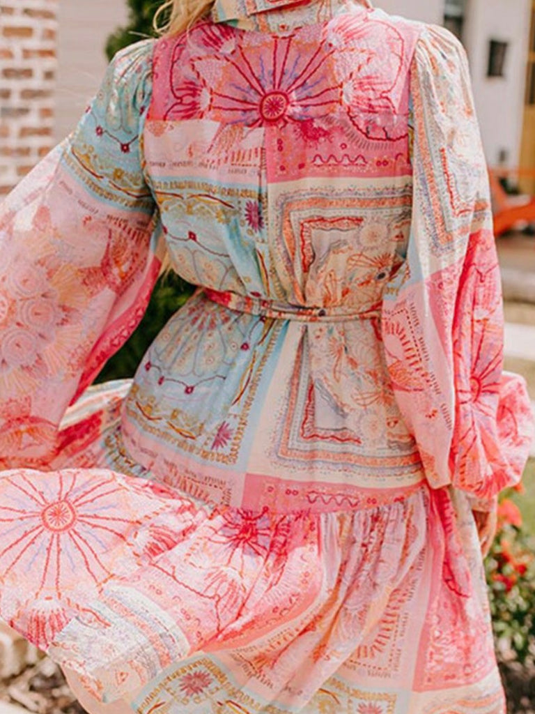 Boho Patches Dress with Bubble Sleeves, Belted Waistline: The belted design cinches your waist, creating a flattering silhouette.
 The colorful blend of patch-style patterns gives the dress a playful yet sophisticated look.