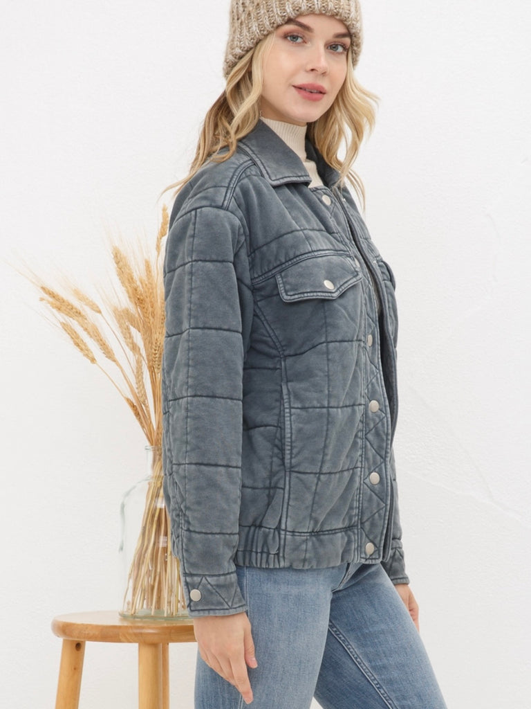 Grey Stone Washed Quilted Jacket! With a playful oversized fit and snap close and elastic waist.