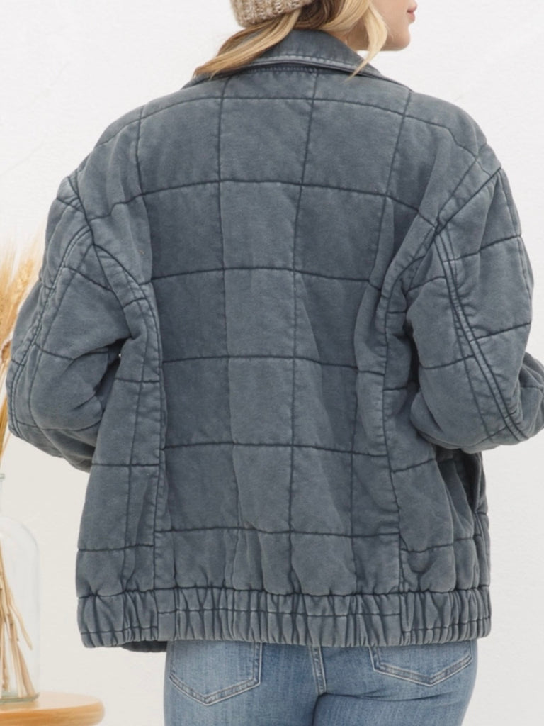 Grey Stone Washed Quilted Jacket! With a playful oversized fit and snap close and elastic waist.