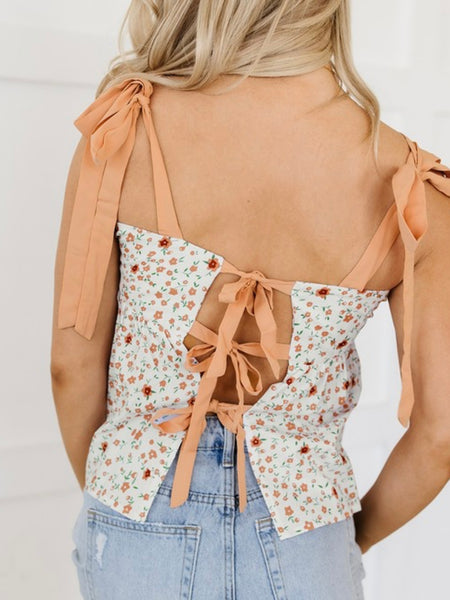 Orange small floral print Tank Top, has a tied shoulder and multiple ties in the back.