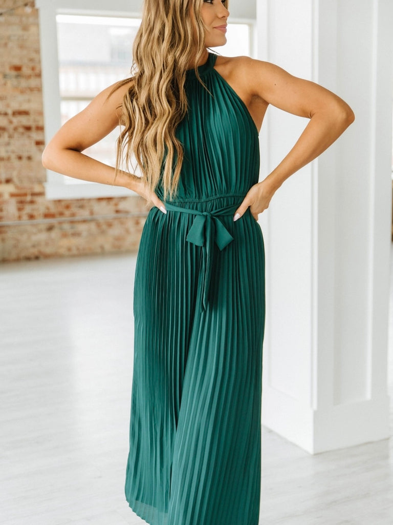 Wide leg , Green Belted Jumpsuit , features a stunning pleated design and a halter neck with keyhole closure.