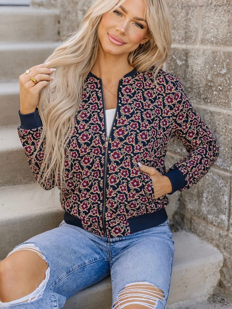 Flowerbomber Jacket with purple flowers on a navy background with triple stretch will keep you comfy all day long.