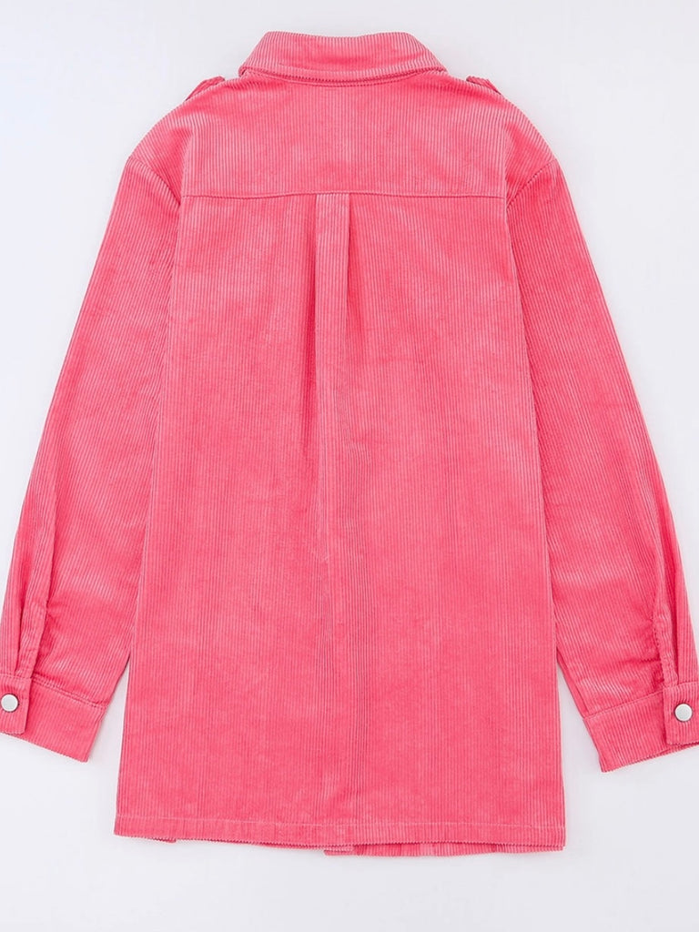 Bright pink corduroy shacket features a button front and front pockets.