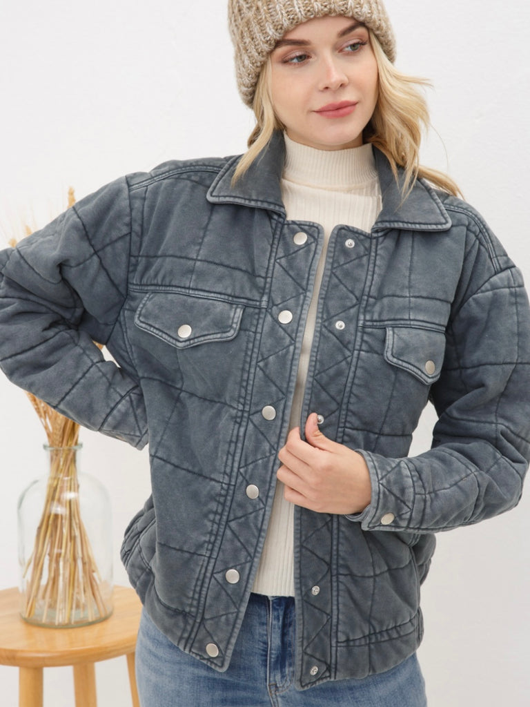 Grey Stone Washed Quilted Jacket! With a playful oversized fit and snap close and elastic waist.