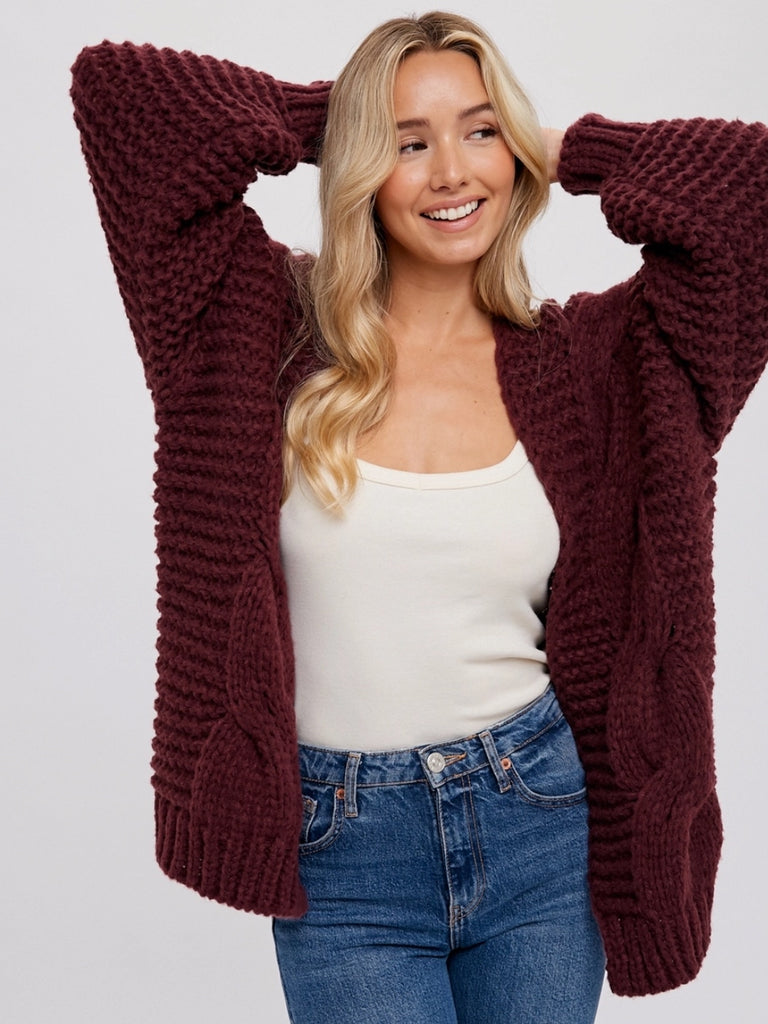 Wine Colour Chunky Cable Cardigan with long batwing sleeves and unique braid pattern, it's an oversize fit.