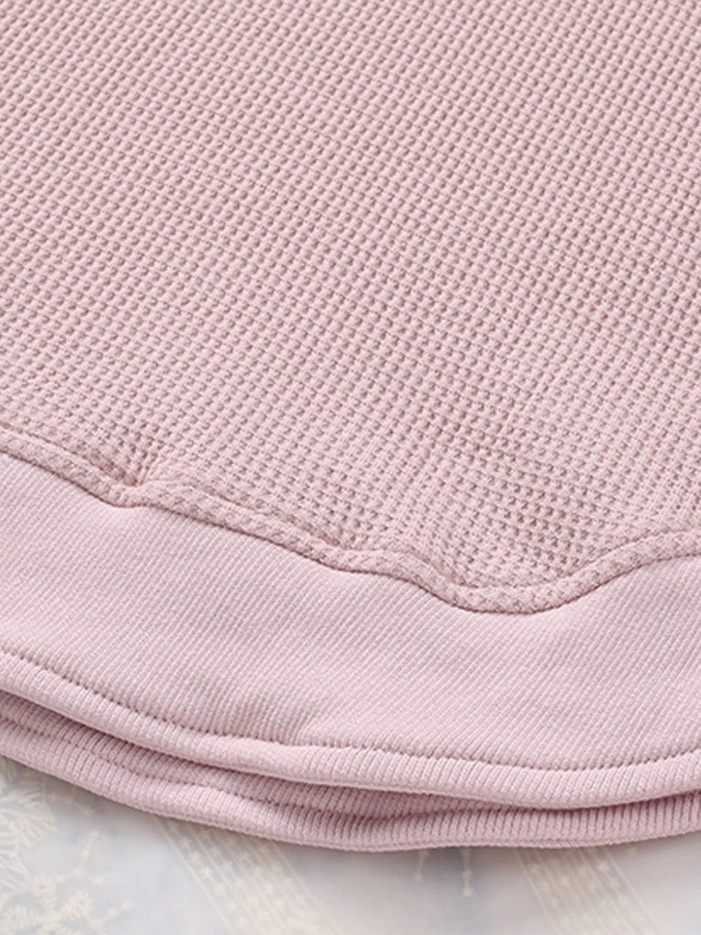 Pink Berlin Waffle Knit Long Sleeve Top. Made with ultra-soft and stretchy fabric and rounded hemline 