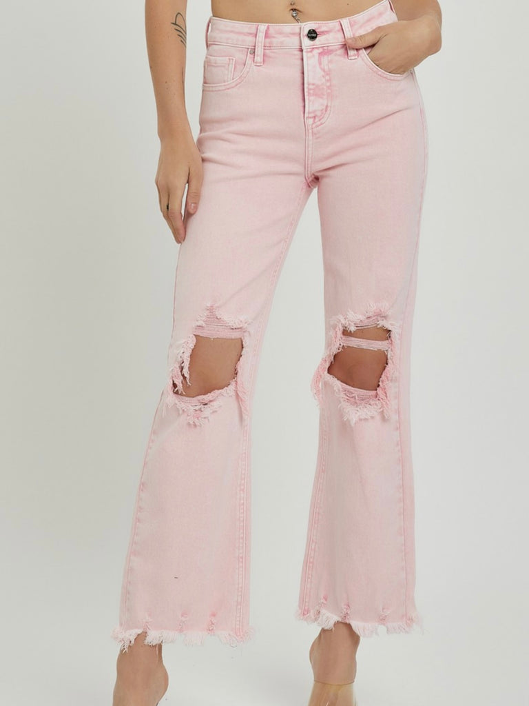  Acid Pink Jeans. Cropped length, distressed knees and frayed hemline.