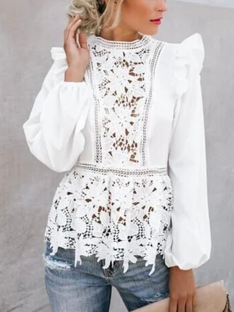  Lace Blouse in White, with ruffled shoulders and neckline and has intricate lace details .