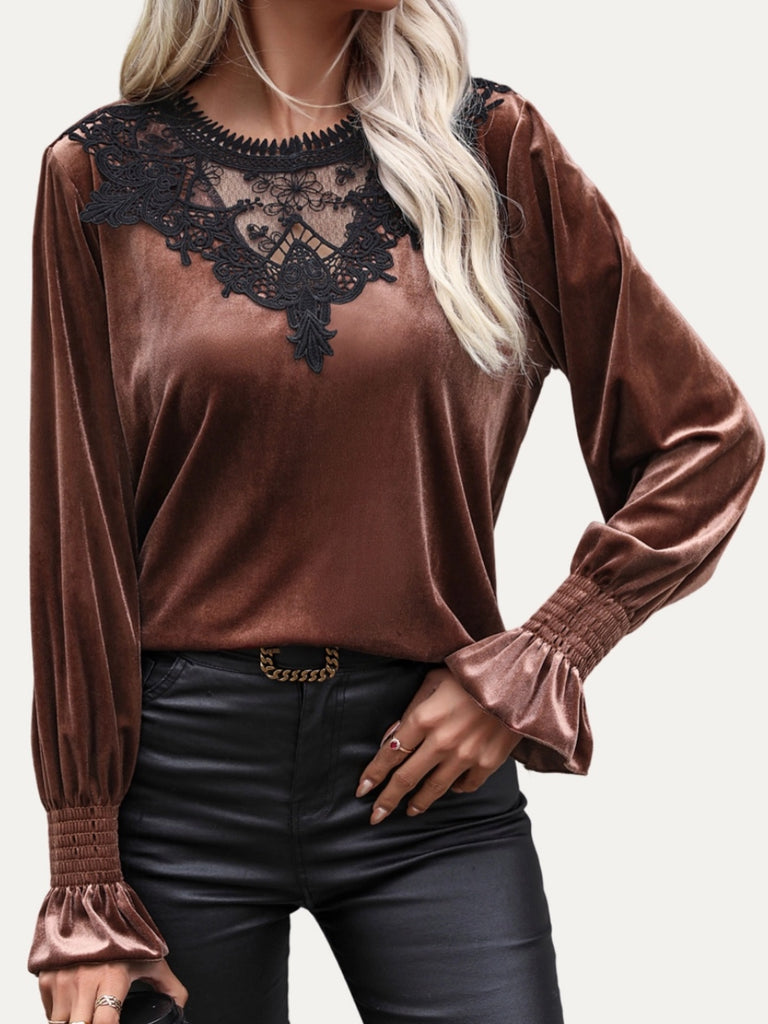  Coffee Brown Velvet Blouse , features a crochet lace pattern, rounded neckline, and long sleeves and a relaxed bodice that features a button at the back and a keyhole .