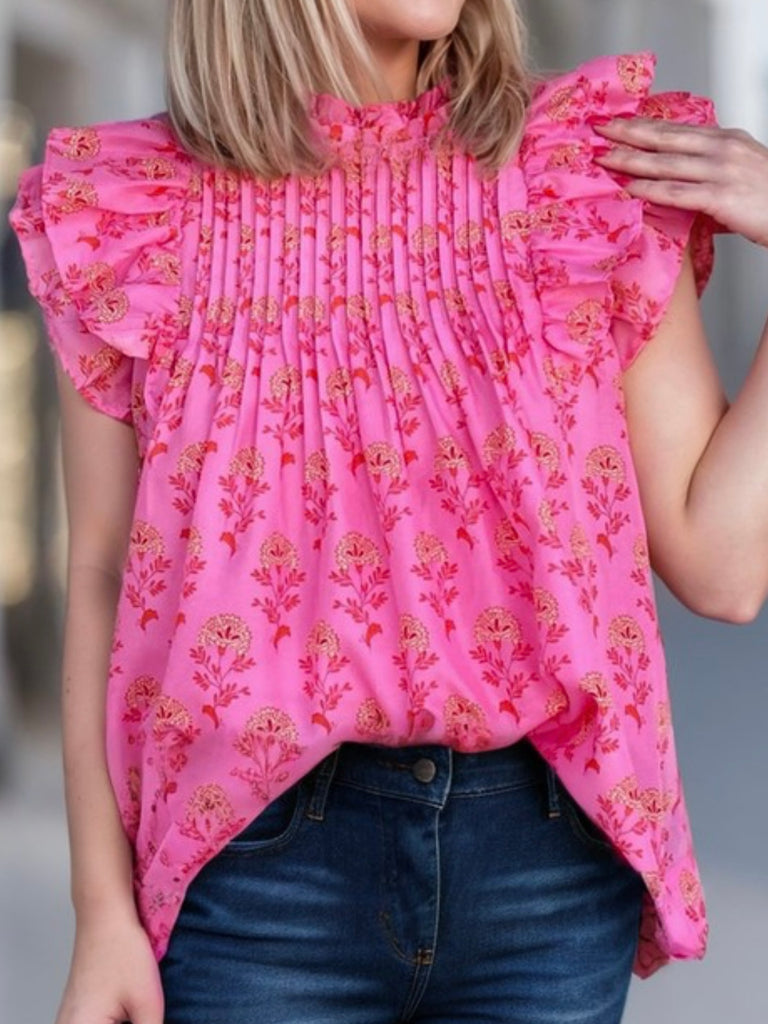 Ruffle pleated blouse in a red boho floral print.