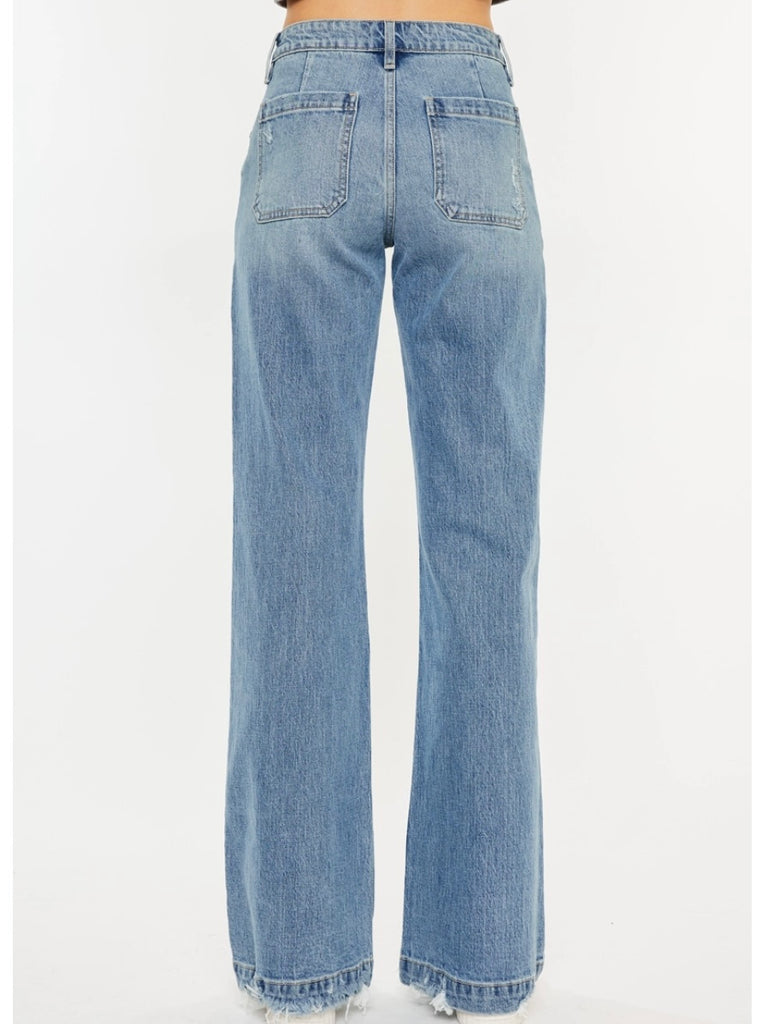 kancan jeans for women with wide pockets on the front and a flare leg