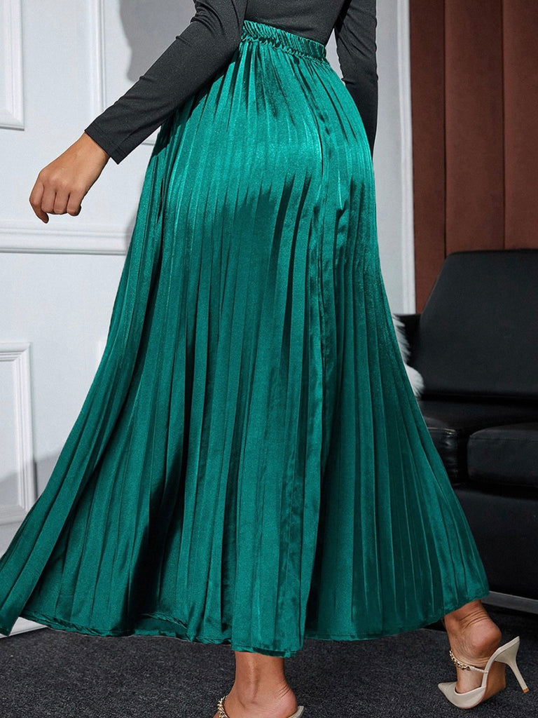 Emerald green satin pleated skirt. High waisted elastic waist band. Lightly lined.