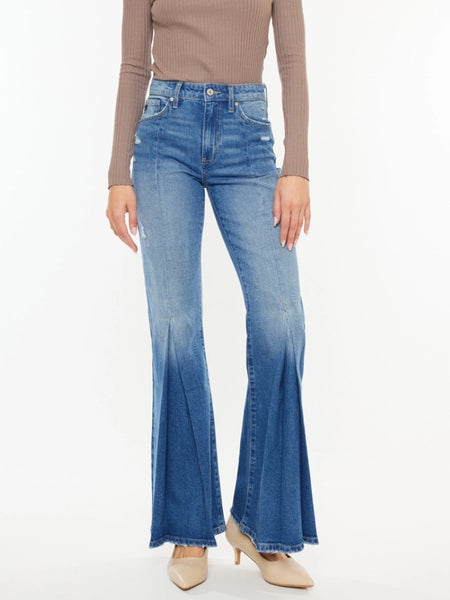 High Rise Flare Jeans with wide leg pleats detail and 5 pocket style, single-button closure, and zip fly.