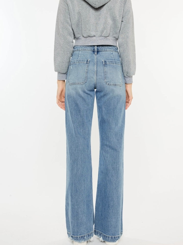 kancan jeans for women with wide pockets on the front and a flare leg