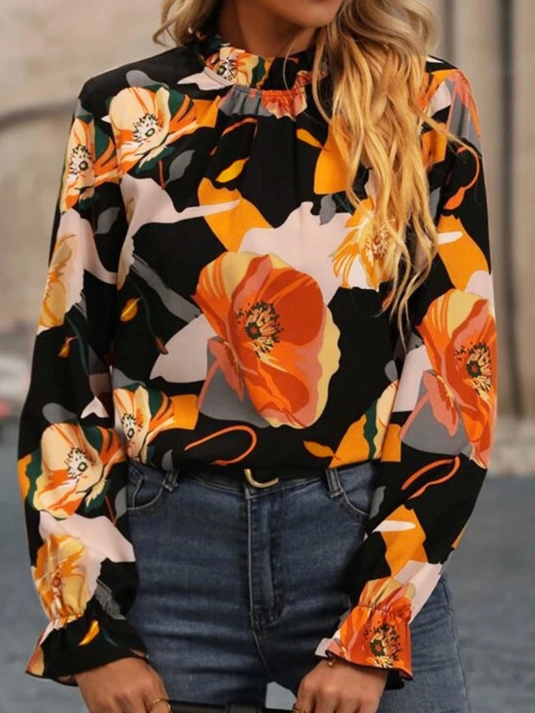 Bold Floral Blouse with Mock neck frill detailing,Ruffled long sleeves and Keyhole back closure.