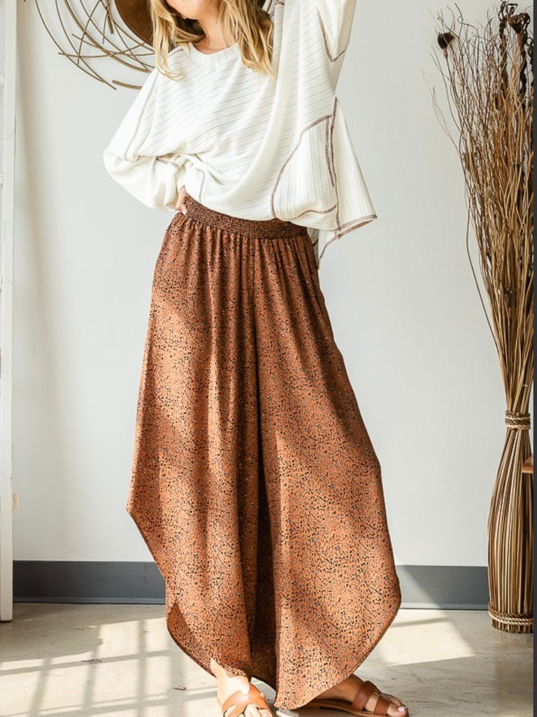 Brown Animal Print Smocked Pants elastic smocking diagonal cut sides that adds a unique detail.