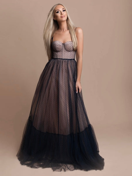 Maxi length Gown with Navy tulle overlay over nude fabric, features Corset-style top tie-up back for a customizable fit, and a long transparent veil adds a touch of allure.