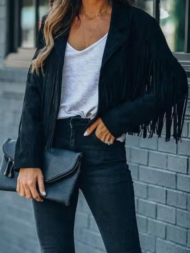 This Black Get Fringed Boho Jacket is perfect for expressive fashionistas looking for a western , southern, or bohemian look.