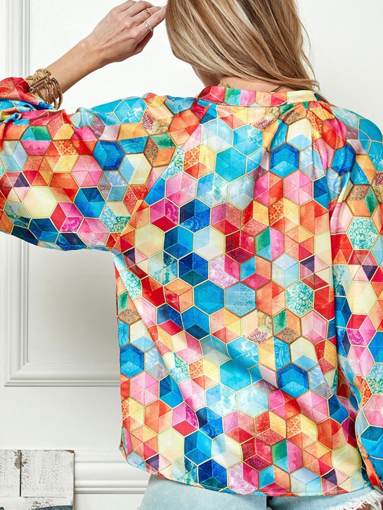 Button down top features a vibrant multicolour box print and 3/4 bubble sleeves , made from 100% Polyester